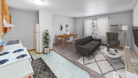 A modern living room with a grey sofa and a white coffee table.