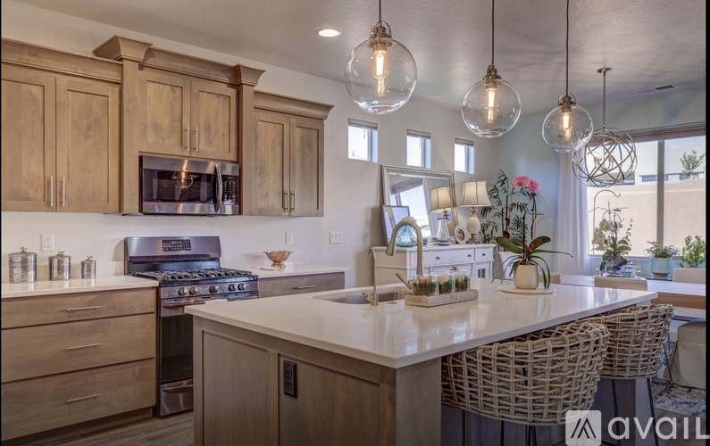 A kitchen with wooden cabinets and a white countertop.