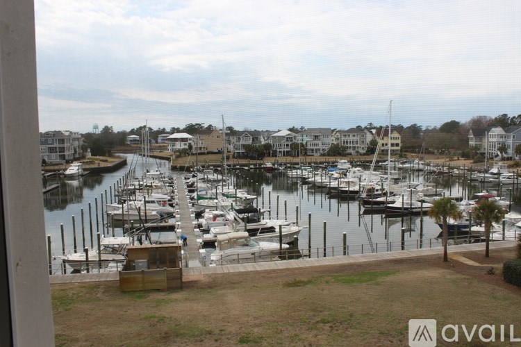 A marina with boats docked in the water.