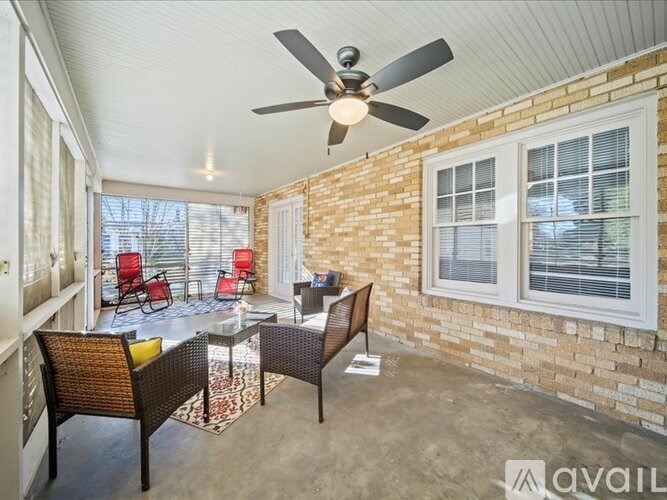 A patio with a table and chairs is available for rent.