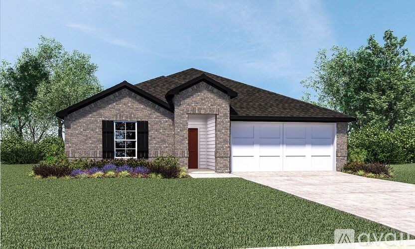 A house with a brown roof and a white garage door.
