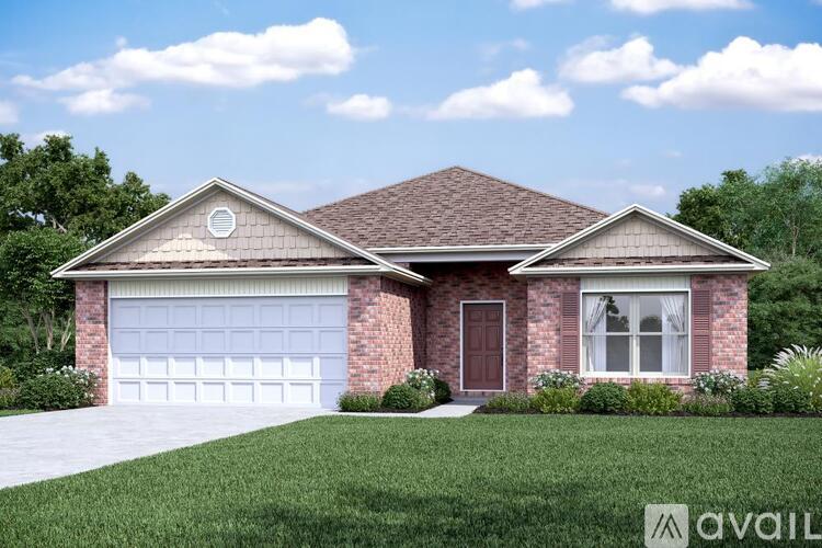 A house with a brick facade and a white garage door.