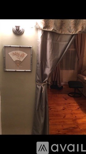 A picture of a diamond shape is on the wall.