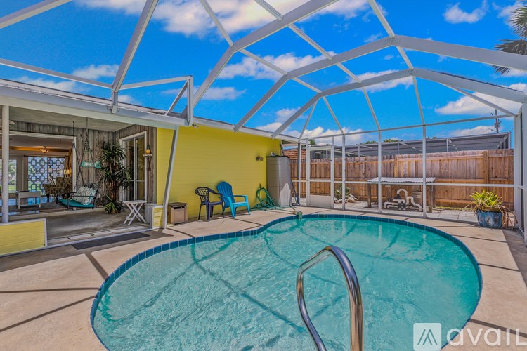 A pool in a covered outdoor area.
