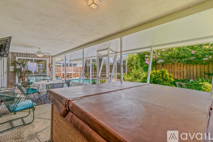 A patio with a table and chairs is available for rent.