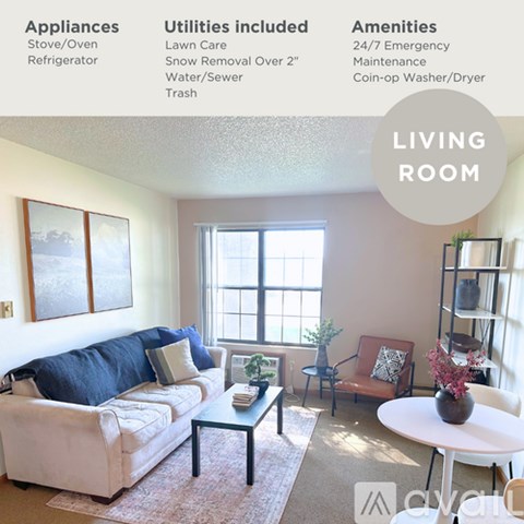 A living room with a white couch, a black coffee table, a red chair, and a white table with a vase on it.