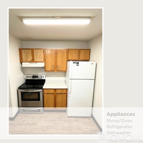 A kitchen with a stove, oven, refrigerator, and dishwasher.