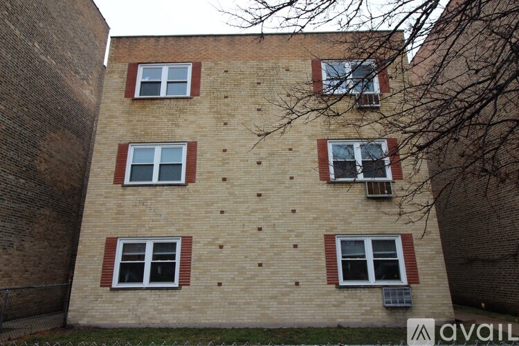 A building with a sign that says "available" in front of it.