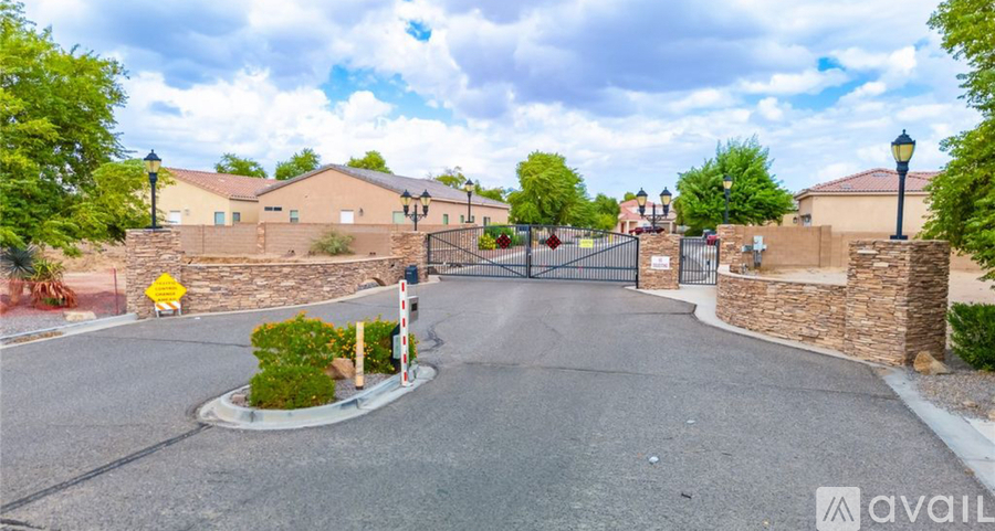 A bird's eye view of a neighborhood with houses and driveways.