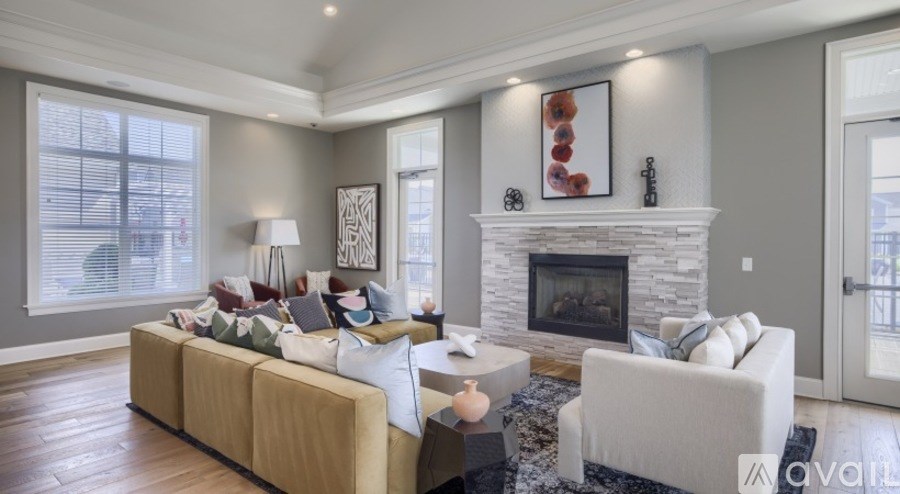 A living room with a fireplace and a couch.