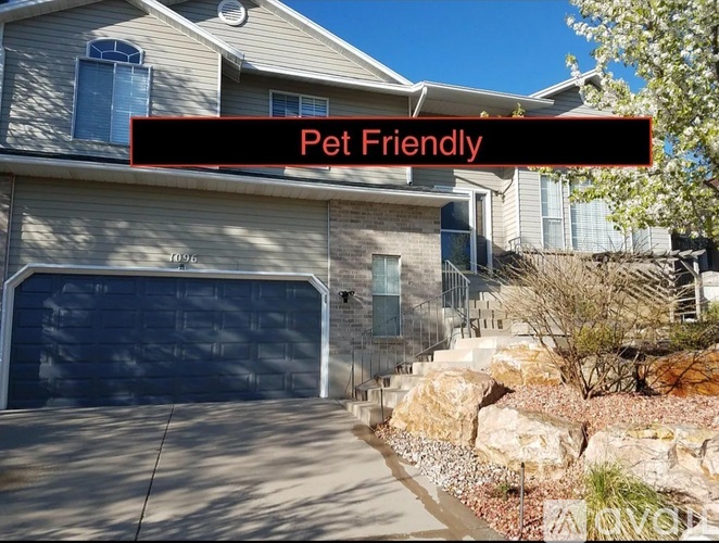 A house with a sign that says Pet Friendly.