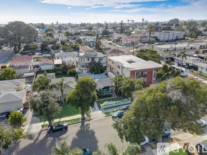 A residential area with houses and trees.
