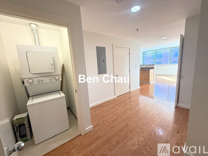 A bedroom with a bed, a chair, and a basketball.