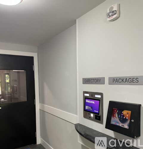A wall with directory and packages written on it.