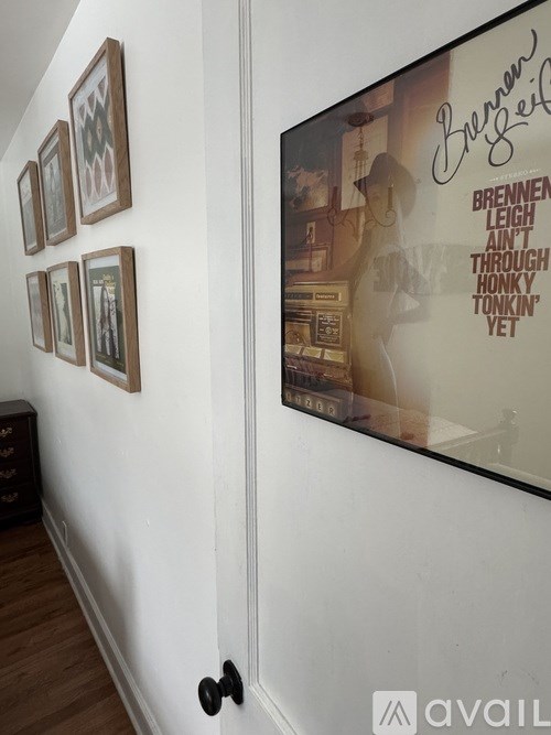 A wall with a picture of a woman and some text on it.