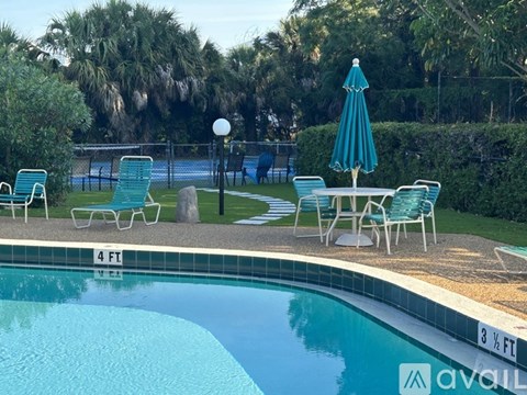 A pool with a 3 feet deep sign.