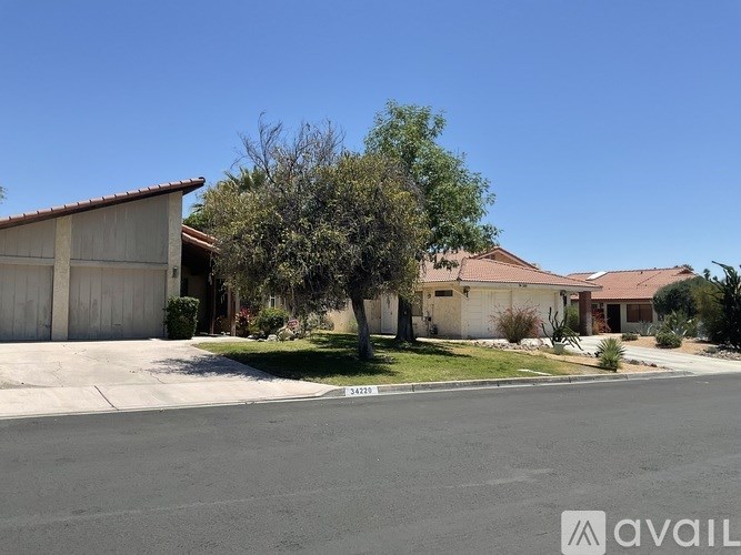 A house with a driveway in front of it.