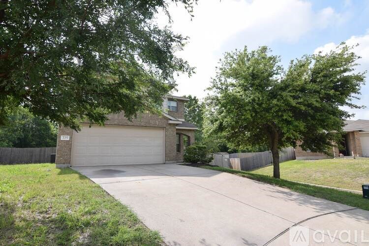 A house with a garage is available for sale.