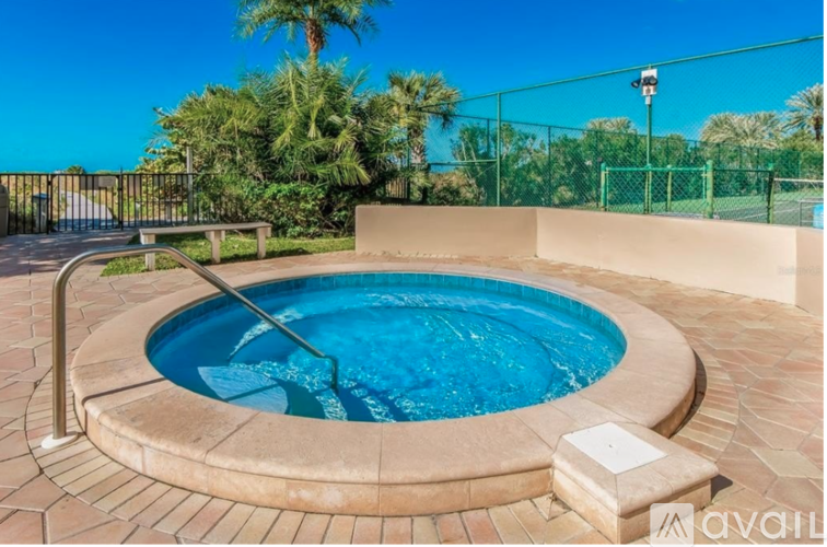 A small round pool with a metal ladder.