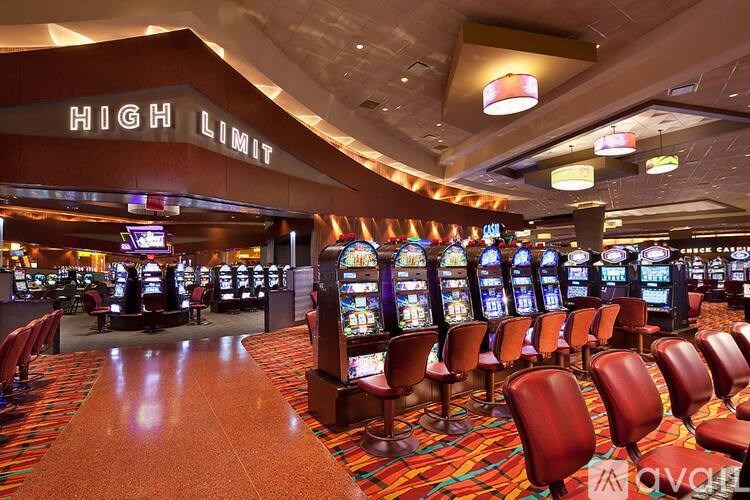 A casino with a red carpet and a sign that says High Limit.