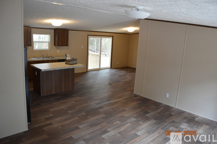A kitchen with a sink and a counter is available for rent.