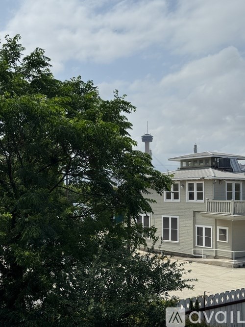 A house with a sign that says "available" in front of it.