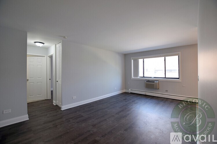 A room with a door and a window.