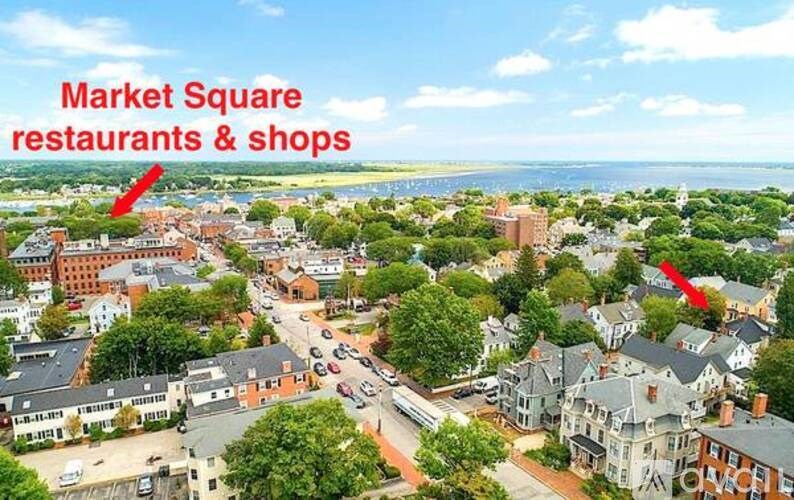A market square with restaurants and shops.