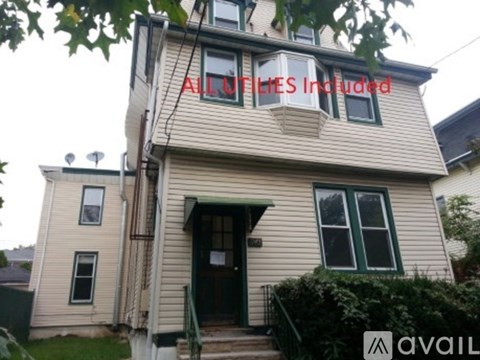 A house with a sign that says "ALL FLOORS Included".