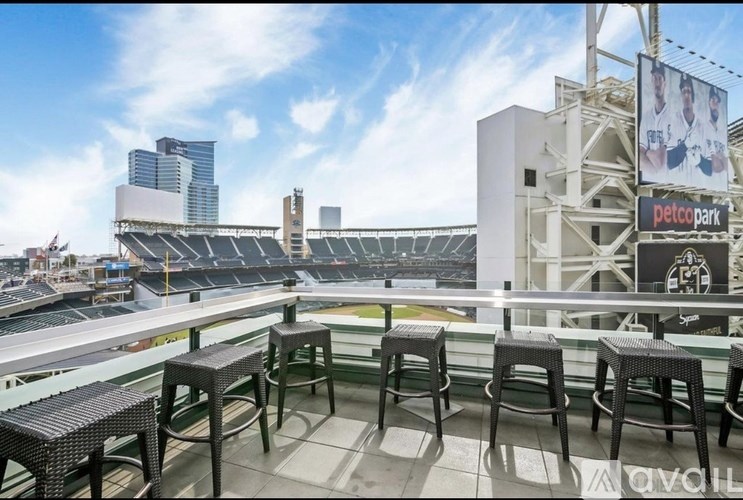 A Petco Park stadium with a bar area in the foreground.