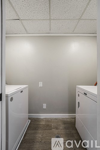 A laundry room with a washer and dryer.