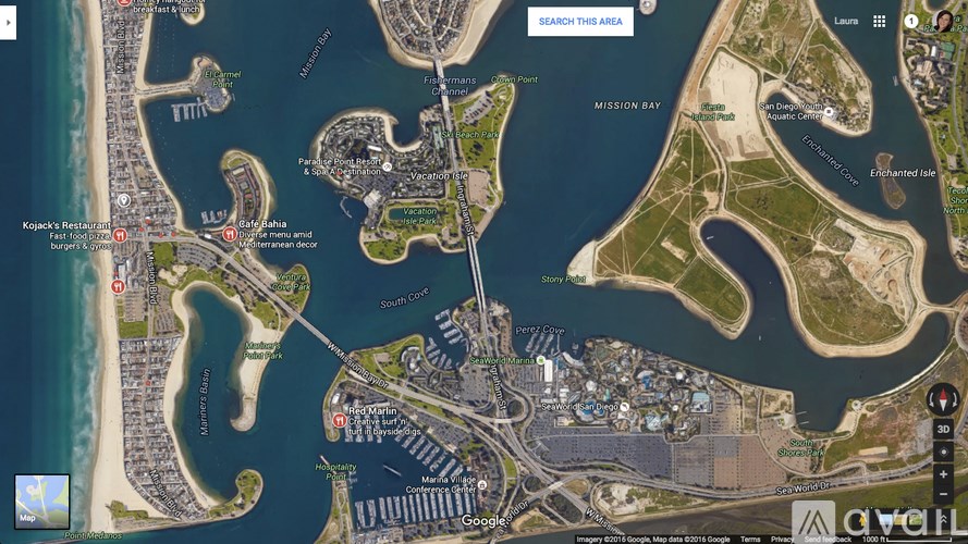 A satellite image of a coastal area with a search bar at the top.