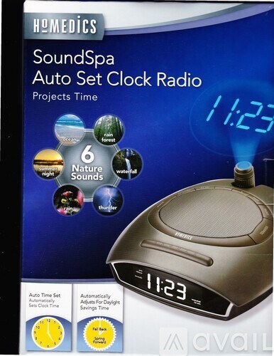 A box for a SoundSpa Auto Set Clock Radio with a brown speaker and a digital clock showing 11:23.
