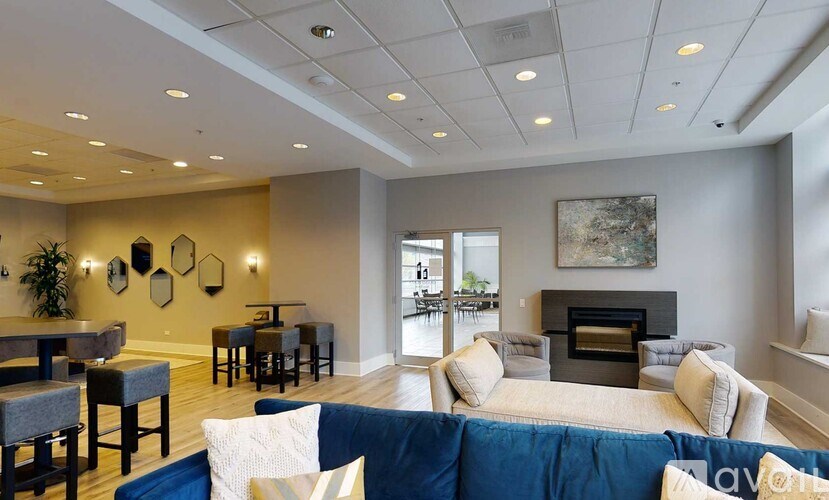 A living room with a fireplace and a couch.