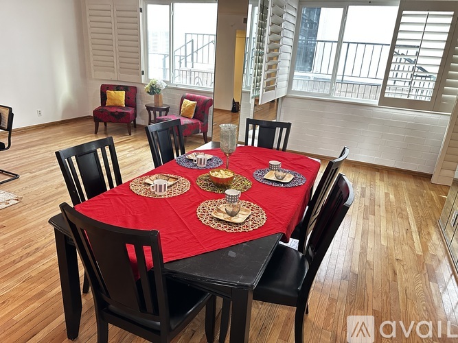 A kitchen with granite countertops and wooden cabinets is available.