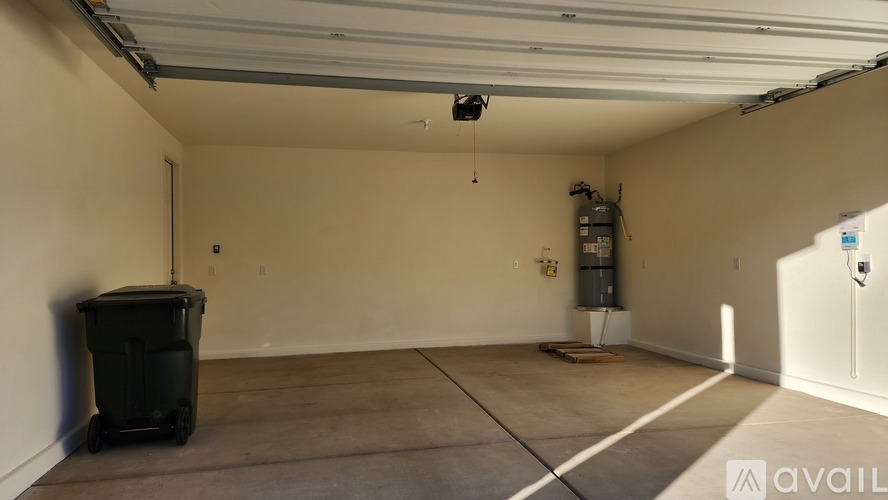 A house with a brown garage door is for sale.