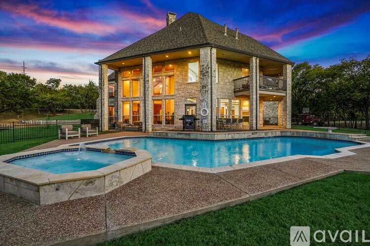 A house with a pool in the backyard.