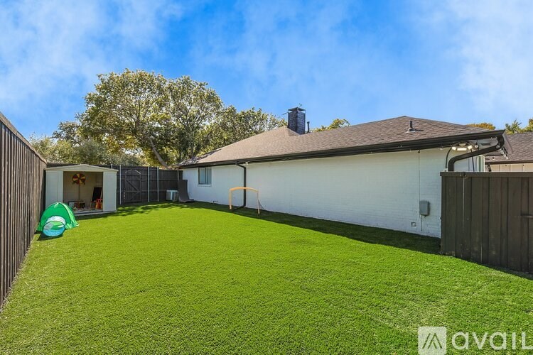 A bedroom with two bunk beds and a window with yellow curtains.