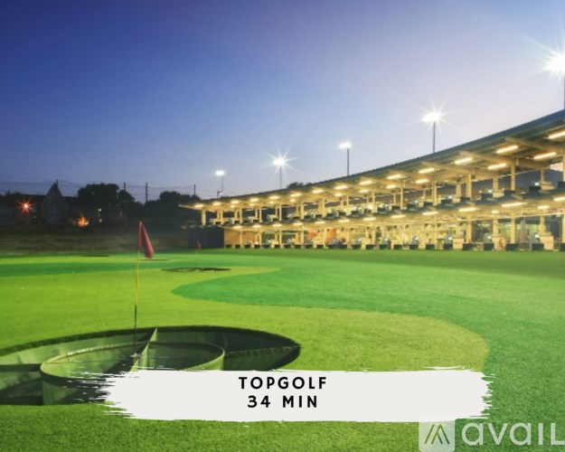 A golf course with a sign that says Topgolf 34 min.