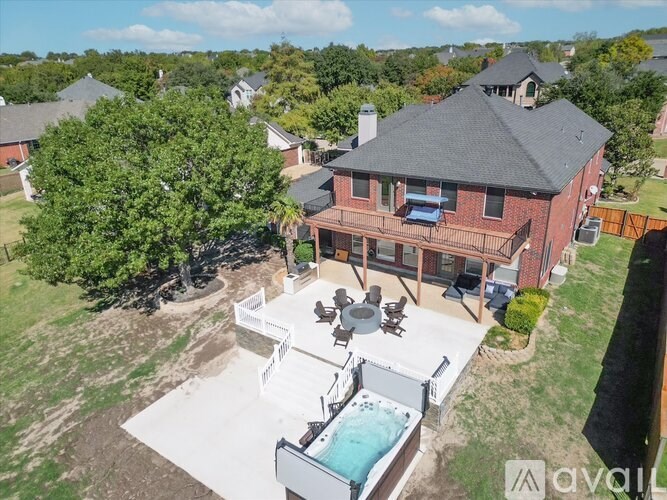 A house with a pool in the backyard.