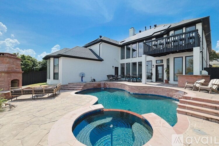 A modern house with a pool in the backyard.