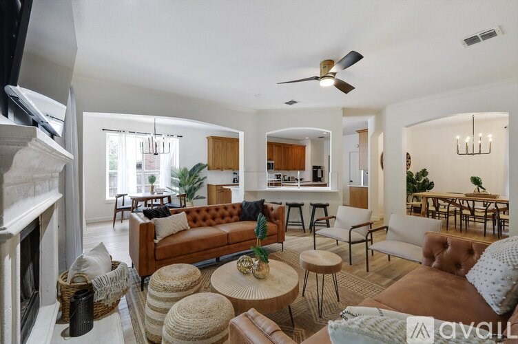 A living room with a fireplace and a couch.