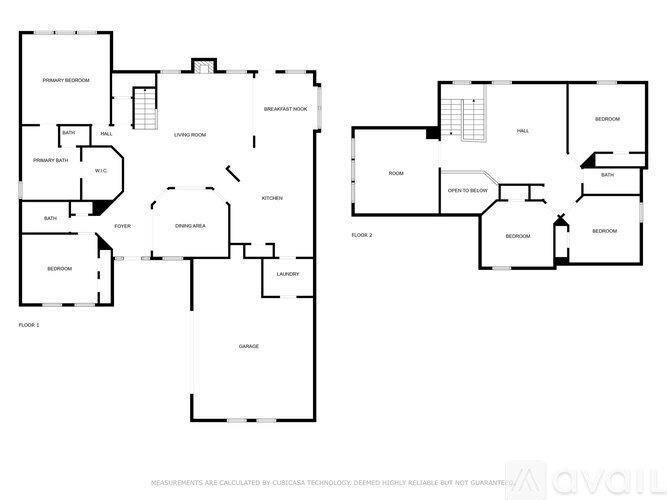 A floor plan of a house with a kitchen, living room, and two bathrooms.