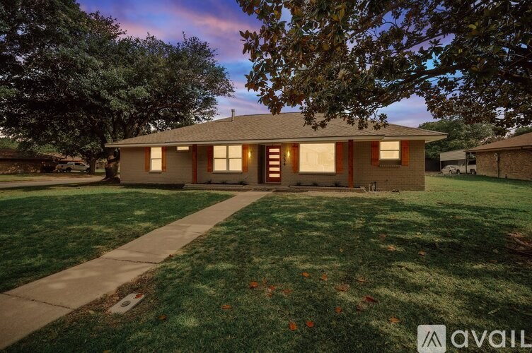 A house with a lawn in front of it is available for sale.