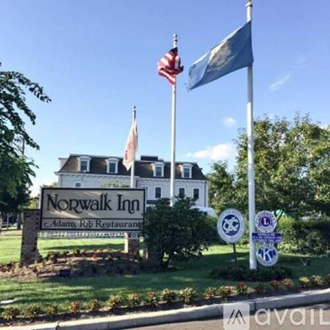 The Norwalk Inn sign is displayed in front of a building.