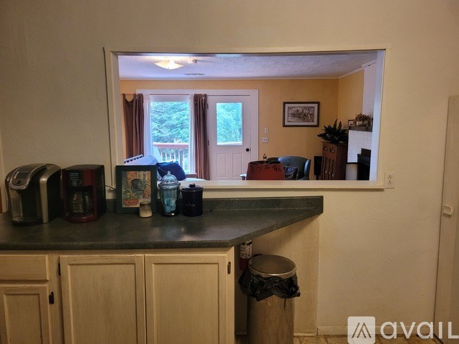 A kitchen with a counter and cabinets.