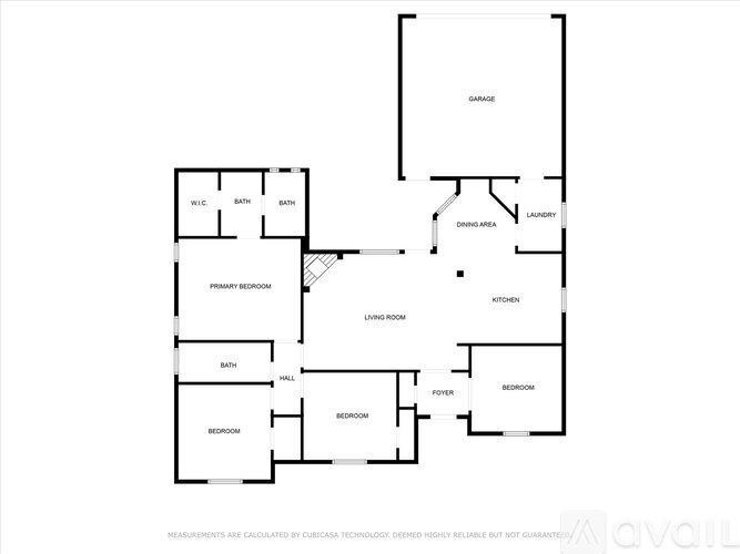 A floor plan of a house with labeled rooms such as garage, living room, and kitchen.