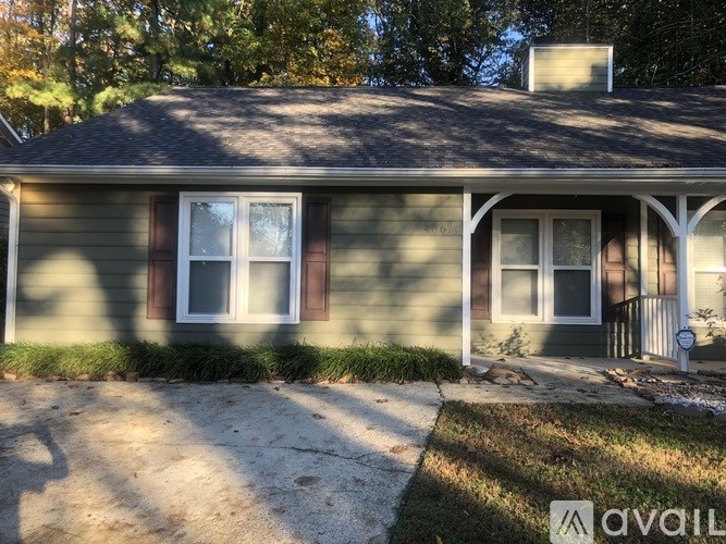 A house with a porch and a sign that says "available".
