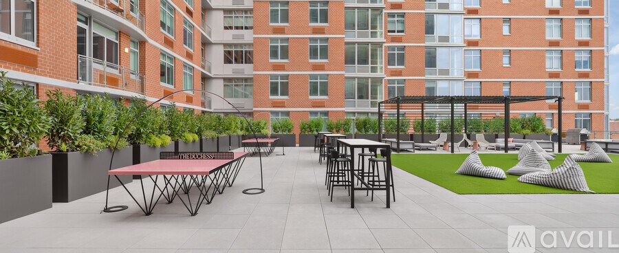 A patio area with tables and chairs is available for rent.