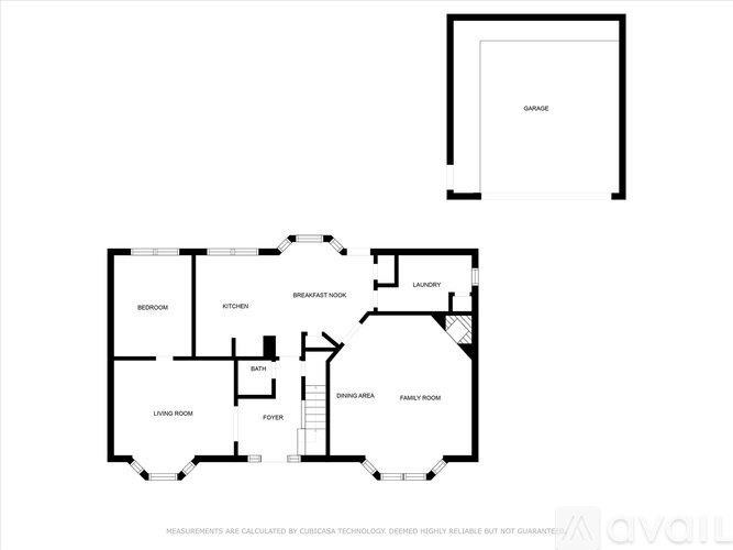 A floor plan of a house with a garage and a living room.